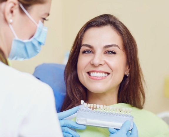 Woman sharing flawless smile after makeover